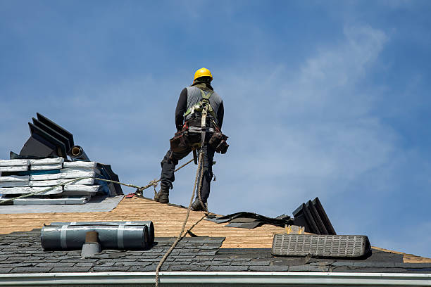Professional Roofing technician working in Fort Hill, PA